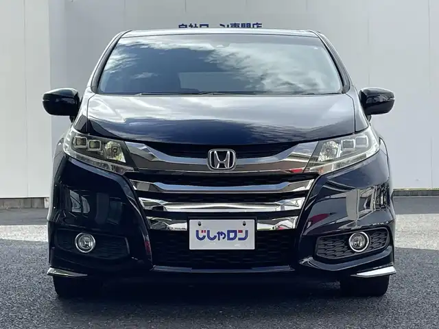 ホンダ オデッセイ アブソルート 埼玉県 2015(平27)年 10.4万km プレミアムヴィーナスブラックP (株)IDOMが運営する【じしゃロン鳩ヶ谷店】の自社ローン専用車両になりますこちらは現金またはオートローンご利用時の価格です。自社ローンご希望の方は別途その旨お申付け下さい/ホンダセンシング/  衝突軽減ブレーキ〈CMBS〉/  誤発進抑制機能/  LKAS〈車線維持支援システム〉/  路外逸脱抑制機能/  ACC〈アダプティブ・クルーズ・コントロール〉/純正ナビ　/　AM/FM/CD/DVD/BT/フルセグTV/バックカメラ　/フリップダウンモニター　/両側パワースライドドア　/パドルシフト　/ステアリングスイッチ　/デュアルエアコン　/キャプテンシート　/オットマン（２列目）/ビルトインＥＴＣ/フォグランプ/プッシュスタートボタン/スマートキー×2/ドアバイザー/電動格納式ウィンカーミラー/保証書