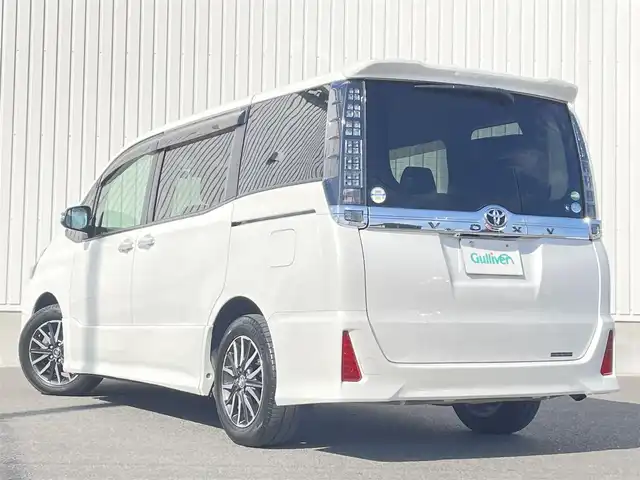 トヨタ ヴォクシー ZS 煌Ⅱ 群馬県 2016(平28)年 4.9万km ホワイトパールクリスタルシャイン 社外9インチナビ/（CD/DVD/SD/HDMI/Bluetooth）/フルセグテレビ/バックカメラ/社外フリップダウンモニター/セーフティセンスC/・プリクラッシュセーフティシステム/・レーンディパーチャーアラート/・オートマチックハイビーム/両側パワースライドドア/プッシュスタート/LEDヘッドランプ/アイドリングストップ/前後ドライブレコーダー