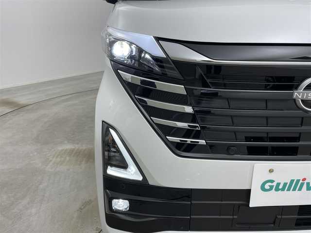 日産 ルークス HWS Gターボ プロパイロットED 岡山県 2023(令5)年 1.3万km ホワイトパール 純正9インチメモリナビ/(フルセグ/Bluetooth/Carplay)/プロパイロット/アラウンドビューモニター/両側パワースライドドア/デジタルインナーミラー/アダプティブLEDヘッドランプ/電動パーキングブレーキ/オートブレーキホールド/エマージェンシーブレーキ/アイドリングストップ/横滑り防止装置/純正15インチアルミホイール/純正フロアマット/プッシュスタート/スマートキー