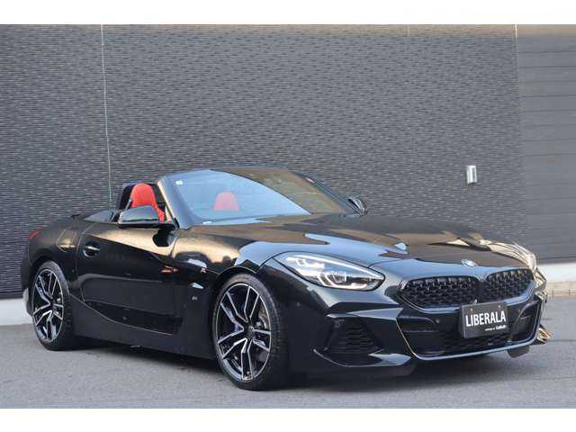 ＢＭＷ Ｚ４ M40i 大分県 2022(令4)年 1.4万km サファイアブラックP インテリジェントセーフティ/ヘッドアップディスプレイ/純正ナビ/ＣａｒＰｌａｙ/Bluetooth/ワイヤレス充電/バックカメラ/赤革（マグマレッド）/シートヒーター/パワーシート/ＬＥＤヘッドライト/アンビエントライト/純正19インチＡＷ/ミラー一体型ＥＴＣ/ドライブレコーダー（前）