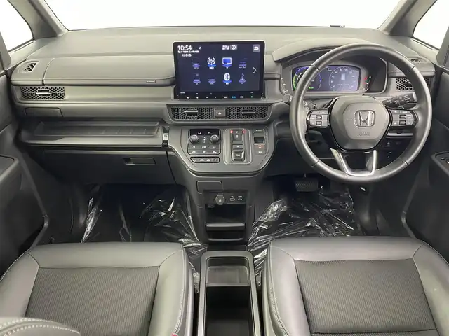 ホンダ ステップワゴン スパーダ eHEV 埼玉県 2024(令6)年 1.9万km プラチナホワイトパール 純正１１．４型ナビ　Ｂカメラ　温シート　ＢＳＭ　ＥＴＣ　両側パワースライドドア　パワーバックドア　オットマン　ハーフレザーシート　オートハイビーム　コーナーセンサー　レーンキープアシスト　純正ＬＥＤ