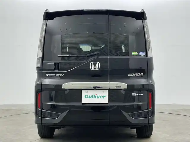 ホンダ ステップワゴン スパーダ eHEV G EXホンダS 岡山県 2021(令3)年 5万km プレミアムスパークルブラックパール 純正10インチナビ/・FM/AM/Bluetooth/フルセグ/CD/DVD/全方位カメラ/純正フリップダウンモニター/デジタルインナーミラー/シートヒーター/両側パワースライドドア/ドライブレコーダー/ETC2.0/ホンダセンシング/・衝突軽減ブレーキ/・車線逸脱警報/・アダプティブクルーズコントロール/・コーナーセンサー/・オートハイビーム/LEDヘッドライト/・フォグライト/純正フロアマット/純正アルミ