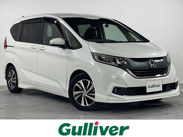 ホンダ フリード G ホンダセンシング 広島県 2018(平30)年 4.8万km ホワイトオーキッドパール 純正９型ナビ　/両側パワースライドドア　/エアロ　/レーダークルーズコントロール　/バックカメラ　/フルセグ　/レーンキープアシスト　/衝突軽減ブレーキ　/コーナーセンサー　/LEDヘッドランプ　/ドラレコ　/ETC/純正１５インチアルミホイール(185/65/R15)/エアバック（運転席/助手席）