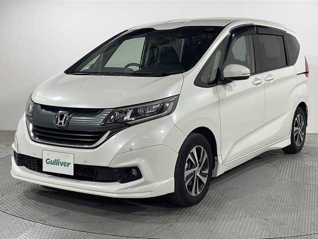 ホンダ フリード G ホンダセンシング 広島県 2018(平30)年 4.8万km ホワイトオーキッドパール 純正９型ナビ　/両側パワースライドドア　/エアロ　/レーダークルーズコントロール　/バックカメラ　/フルセグ　/レーンキープアシスト　/衝突軽減ブレーキ　/コーナーセンサー　/LEDヘッドランプ　/ドラレコ　/ETC/純正１５インチアルミホイール(185/65/R15)/エアバック（運転席/助手席）