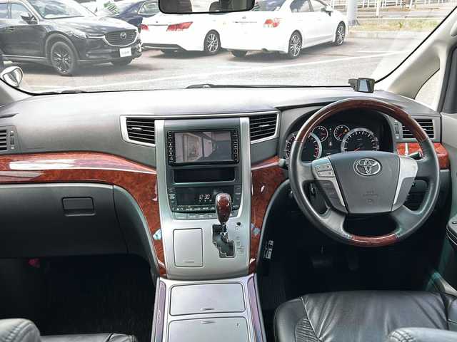 トヨタ ヴェルファイア 2．4Z プラチナセレクションⅡ 新潟県 2010(平22)年 16.7万km ホワイトパールクリスタルシャイン ・寒冷地仕様/・純正ナビ&CD&DVD/・両側パワースライドドア/・パワーバックドア/・バックカメラ/・コーナーセンサー/・フリップダウンモニター/・ステアリングスイッチ/・社外ＥＴＣ/・社外GPSレーダー/・TVキャンセラー/・プッシュスタート/・レザー調シートカバー/・ＨＩＤヘッドライト/・フォグランプ/・オートライト/・スマートキー/・社外エンジンスターター/・社外ＡＷ夏タイヤ積込