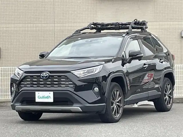 トヨタ ＲＡＶ４ ハイブリットG 山口県 2021(令3)年 3.4万km アティチュードブラックマイカ 4WD/黒レザーシート/運転席パワーシート/前席シートヒーター/9型SDナビ フルセグTV CD DVD BT/バックカメラ/TRD ルーフキャリア/BALMINUM 18インチアルミホイール/パワーバックドア/デジタルインナーミラー/衝突被害軽減ブレーキ/レーダークルーズコントロール/レーンアシスト/オートマチックハイビーム/ブラインドスポットモニタ/LEDオートヘッドライト/フォグライト /コーナーセンサー /スマートキー 2個/ステアリングヒーター/ドラレコ/ビルトインETC/ステアリングリモコン/AC100V電源/W サイド カーテン ニー エアバッグ/保証書 取説 ナビ取説/禁煙車