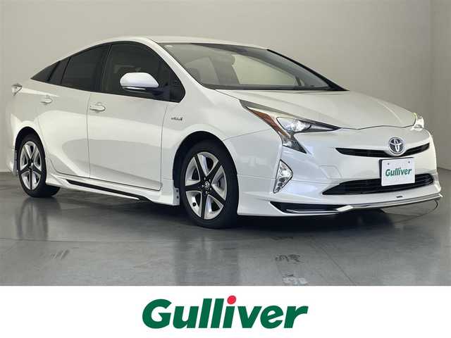 トヨタ プリウス S ツーリングセレクション 愛知県 2016(平28)年 11.5万km ホワイトパールクリスタルシャイン 社外ナビ　フルセグＴＶ　ＤＶＤ再生　Ｂｌｕｅｔｏｏｔｈ　バックカメラ　モデリスタエアロ　黒革　シートヒーター　レーダー探知機　ＬＥＤヘッドライト　オートライト　プッシュスタート　スマートキー　禁煙車