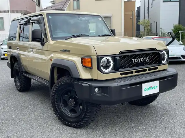 トヨタ ランドクルーザー AX 神奈川県 2025(令7)年 0.2万km ベージュ ワンオーナー/社外16インチAW/LEDヘッドライト/革調シートカバー/社外デジタルミラー(前後ドラレコ)/社外ディスプレイオーディオ/AppleCarPlay/AndroidAuto/USB/BT/バックモニター/ETC2.0/社外セキュリティ(ユピテル)/クルーズコントロール/PCS/LDA/RSA/オートハイビーム/ヒルディセントコントロール/デフロック/キーレス×2/R7年ディーラー整備記録/保証書・取説あり