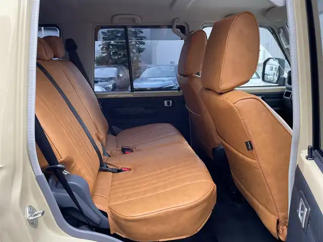 トヨタ ランドクルーザー AX 神奈川県 2025(令7)年 0.2万km ベージュ ワンオーナー/社外16インチAW/LEDヘッドライト/革調シートカバー/社外デジタルミラー(前後ドラレコ)/社外ディスプレイオーディオ/AppleCarPlay/AndroidAuto/USB/BT/バックモニター/ETC2.0/社外セキュリティ(ユピテル)/クルーズコントロール/PCS/LDA/RSA/オートハイビーム/ヒルディセントコントロール/デフロック/キーレス×2/R7年ディーラー整備記録/保証書・取説あり