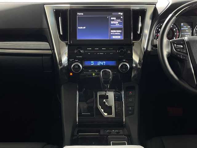 トヨタ アルファード S Cパッケージ 神奈川県 2023(令5)年 1.2万km ホワイトパールクリスタルシャイン ツインムーンルーフ/モデリスタスポイラー【フロント/サイド/リア】/モデリスタマフラー/純正9型ディスプレイオーディオ/純正フリップダウンモニター【V12T-R68C】/フルセグ　Bluetooth　/バックカメラ/両側電動スライドドア【サンシェード】/デジタルインナーミラー/パワーバックドア/セーフティセンス/レーダークルーズコントロール/プリクラッシュセーフティ/ロードサインアシスト/レーントレーシングアシスト/アダブティブハイビームシステム/ブラインドスポットモニター/リアクロストラフィックアラート/先行車発進告知/前後ソナー/nanoe/ETC/社外前方ドライブレコーダー/合皮シート/前席シートヒーター/パワーシート/ベンチレーション/助手席パワーオットマン/2列目エグゼクティブパワーシート/運転席ポジションメモリー/木目調/革巻きコンビステアリング/ステアリングヒーター/電動パーキングブレーキ/ブレーキオートホールド/プッシュスタート/スマートキー/純正18インチアルミホイール/LEDヘッド/フォグランプ/