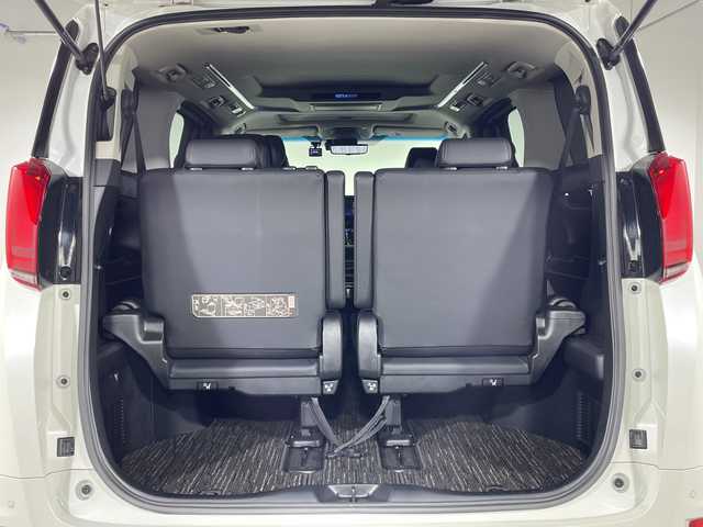 トヨタ アルファード S Cパッケージ 神奈川県 2023(令5)年 1.2万km ホワイトパールクリスタルシャイン ツインムーンルーフ/モデリスタスポイラー【フロント/サイド/リア】/モデリスタマフラー/純正9型ディスプレイオーディオ/純正フリップダウンモニター【V12T-R68C】/フルセグ　Bluetooth　/バックカメラ/両側電動スライドドア【サンシェード】/デジタルインナーミラー/パワーバックドア/セーフティセンス/レーダークルーズコントロール/プリクラッシュセーフティ/ロードサインアシスト/レーントレーシングアシスト/アダブティブハイビームシステム/ブラインドスポットモニター/リアクロストラフィックアラート/先行車発進告知/前後ソナー/nanoe/ETC/社外前方ドライブレコーダー/合皮シート/前席シートヒーター/パワーシート/ベンチレーション/助手席パワーオットマン/2列目エグゼクティブパワーシート/運転席ポジションメモリー/木目調/革巻きコンビステアリング/ステアリングヒーター/電動パーキングブレーキ/ブレーキオートホールド/プッシュスタート/スマートキー/純正18インチアルミホイール/LEDヘッド/フォグランプ/