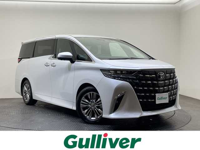 トヨタ アルファード Z 愛媛県 2025(令7)年 0.5万km プラチナホワイトパールマイカ 純正ナビ１３．２型フリップダウン/純正１４インチディスプレイオーディオ/フルセグTV Bluetooth /左右ツインムーンルーフ/ユニバーサルステップ//デジタルインナーミラー/ブラインドスポットモニター/ＥＴＣ２．０/シートヒーター/シートエアコン/レザーシート/アラウンドビューモニター/両側スライドドア/コーナーセンサー