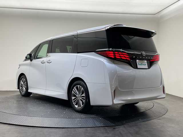 トヨタ アルファード Z 愛媛県 2025(令7)年 0.5万km プラチナホワイトパールマイカ 純正ナビ１３．２型フリップダウン/純正１４インチディスプレイオーディオ/フルセグTV Bluetooth /左右ツインムーンルーフ/ユニバーサルステップ//デジタルインナーミラー/ブラインドスポットモニター/ＥＴＣ２．０/シートヒーター/シートエアコン/レザーシート/アラウンドビューモニター/両側スライドドア/コーナーセンサー