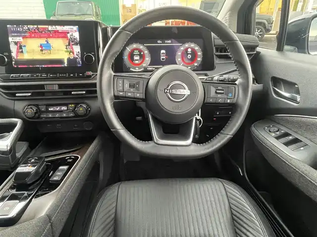 日産 オーラ G レザーエディション 島根県 2024(令6)年 1.3万km パープル ワンオーナー　/純正９型メモリナビ　/ＢＯＳＥサウンドシステム　/フルセグ/Ｂｌｕｅｔｏｏｔｈ　/全方位カメラ/ビルトインＥＴＣ2.0/前後ドラレコ　/インテリジェントクルーズコントロール　/ハーフレザーシート　/前席シートヒーター　/純正LEDライト　/前後コーナーセンサー