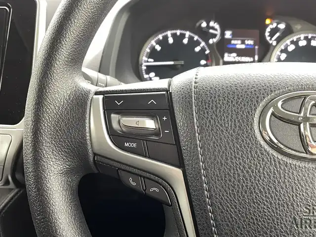 トヨタ ランドクルーザー プラド TX 熊本県 2019(令1)年 3.6万km ホワイトパールクリスタルシャイン 禁煙車　/モデリスタエアロ（Ｆ）/純正ナビ（ＣＤ・ＤＶＤ・フルセグ・ＢＴ・ＳＤ・ＵＳＢ）/バックカメラ　/社外全方位ドライブレコーダー　/ヘッドレスト取り付後席モニター/ビルトインＥＴＣ　/前後クリアランスソナー/レーダークルーズコントロール/衝突軽減ブレーキ/レーンキープアシスト/ダウンヒルアシスト/横滑り防止/ルーフレール/前後クリアランスソナー/ガナドールマフラー/純正フロアマット/RAYS２０インチAW/オートライト/オートマチックハイビーム/LEDヘッドライト/フォグライト/スマートキー/プッシュスタート/スペアキー1本/保証書/取扱説明書