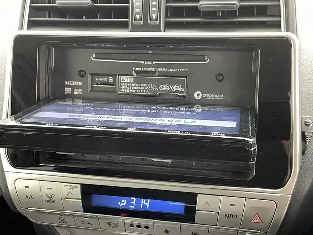 トヨタ ランドクルーザー プラド TX 熊本県 2019(令1)年 3.6万km ホワイトパールクリスタルシャイン 禁煙車　/モデリスタエアロ（Ｆ）/純正ナビ（ＣＤ・ＤＶＤ・フルセグ・ＢＴ・ＳＤ・ＵＳＢ）/バックカメラ　/社外全方位ドライブレコーダー　/ヘッドレスト取り付後席モニター/ビルトインＥＴＣ　/前後クリアランスソナー/レーダークルーズコントロール/衝突軽減ブレーキ/レーンキープアシスト/ダウンヒルアシスト/横滑り防止/ルーフレール/前後クリアランスソナー/ガナドールマフラー/純正フロアマット/RAYS２０インチAW/オートライト/オートマチックハイビーム/LEDヘッドライト/フォグライト/スマートキー/プッシュスタート/スペアキー1本/保証書/取扱説明書