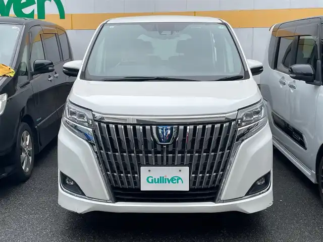 トヨタ エスクァイア ハイブリッド Gi プレミアムパッケージ 東京都 2017(平29)年 5.9万km ホワイトパールクリスタルシャイン 純正SDナビ/・ワンセグTV/・Bluetooth接続/・FM・AM/トヨタセーフティーセンス/・バックカメラ/・先行車発進告知機能/茶革ハーフレザーシート/・シートヒーター/ステアリングヒーター/両側パワースライドドア/クルーズコントロール/LEDヘッドライド/LEDコーナリングランプ/オートライト/ABS/横滑り防止/盗難防止/スマートキー/ダブルエアバッグ/保証書＆取扱説明書