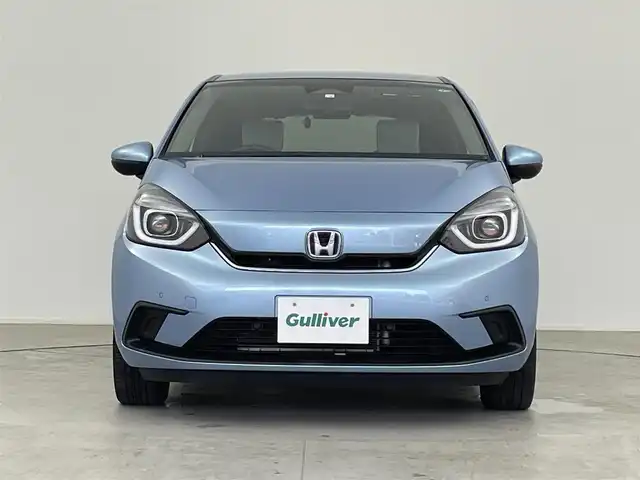 ホンダ フィット e:HEVホーム 千葉県 2020(令2)年 3万km ライトブルー 純正メモリナビ/　(CD DVD BT MSV SD USB TV)/バックカメラ/ETC/横滑り防止装置/衝突被害軽減システム/レーンキープアシスト/コーナーセンサー/追従機能付きクルーズコントロール/SOSボタン/LEDライト/ウィンカーミラー/ヘッドライトレベライザー/純正AW/ドアバイザー/電動パーキングブレーキ/オートホールドスイッチ/ステアリングスイッチ/USB端子/チップアップシート/プッシュスタート/スマートキー