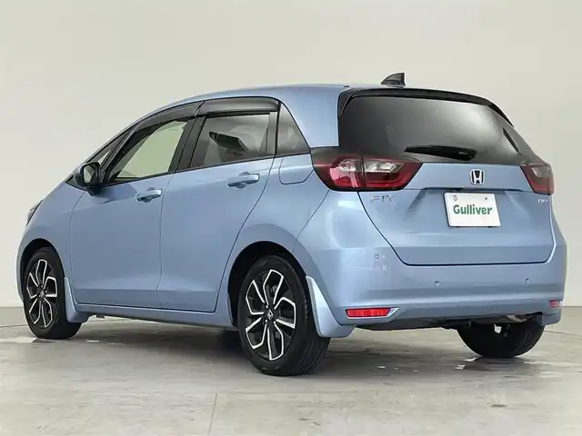 ホンダ フィット e:HEVホーム 千葉県 2020(令2)年 3万km ライトブルー 純正メモリナビ/　(CD DVD BT MSV SD USB TV)/バックカメラ/ETC/横滑り防止装置/衝突被害軽減システム/レーンキープアシスト/コーナーセンサー/追従機能付きクルーズコントロール/SOSボタン/LEDライト/ウィンカーミラー/ヘッドライトレベライザー/純正AW/ドアバイザー/電動パーキングブレーキ/オートホールドスイッチ/ステアリングスイッチ/USB端子/チップアップシート/プッシュスタート/スマートキー