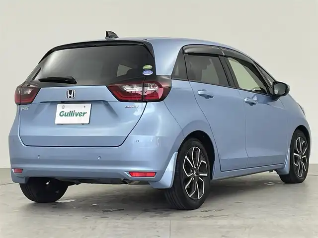 ホンダ フィット e:HEVホーム 千葉県 2020(令2)年 3万km ライトブルー 純正メモリナビ/　(CD DVD BT MSV SD USB TV)/バックカメラ/ETC/横滑り防止装置/衝突被害軽減システム/レーンキープアシスト/コーナーセンサー/追従機能付きクルーズコントロール/SOSボタン/LEDライト/ウィンカーミラー/ヘッドライトレベライザー/純正AW/ドアバイザー/電動パーキングブレーキ/オートホールドスイッチ/ステアリングスイッチ/USB端子/チップアップシート/プッシュスタート/スマートキー