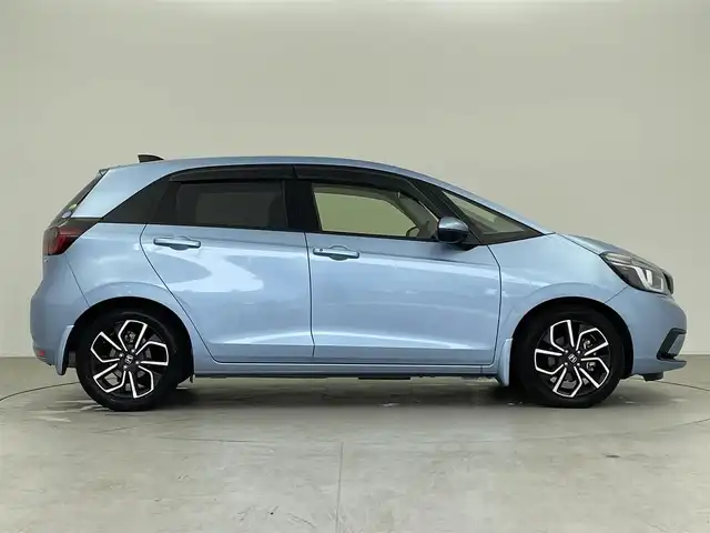 ホンダ フィット e:HEVホーム 千葉県 2020(令2)年 3万km ライトブルー 純正メモリナビ/　(CD DVD BT MSV SD USB TV)/バックカメラ/ETC/横滑り防止装置/衝突被害軽減システム/レーンキープアシスト/コーナーセンサー/追従機能付きクルーズコントロール/SOSボタン/LEDライト/ウィンカーミラー/ヘッドライトレベライザー/純正AW/ドアバイザー/電動パーキングブレーキ/オートホールドスイッチ/ステアリングスイッチ/USB端子/チップアップシート/プッシュスタート/スマートキー