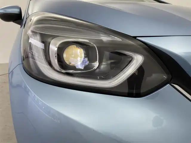 ホンダ フィット e:HEVホーム 千葉県 2020(令2)年 3万km ライトブルー 純正メモリナビ/　(CD DVD BT MSV SD USB TV)/バックカメラ/ETC/横滑り防止装置/衝突被害軽減システム/レーンキープアシスト/コーナーセンサー/追従機能付きクルーズコントロール/SOSボタン/LEDライト/ウィンカーミラー/ヘッドライトレベライザー/純正AW/ドアバイザー/電動パーキングブレーキ/オートホールドスイッチ/ステアリングスイッチ/USB端子/チップアップシート/プッシュスタート/スマートキー