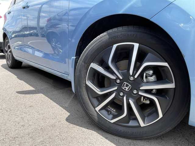 ホンダ フィット e:HEVホーム 千葉県 2020(令2)年 3万km ライトブルー 純正メモリナビ/　(CD DVD BT MSV SD USB TV)/バックカメラ/ETC/横滑り防止装置/衝突被害軽減システム/レーンキープアシスト/コーナーセンサー/追従機能付きクルーズコントロール/SOSボタン/LEDライト/ウィンカーミラー/ヘッドライトレベライザー/純正AW/ドアバイザー/電動パーキングブレーキ/オートホールドスイッチ/ステアリングスイッチ/USB端子/チップアップシート/プッシュスタート/スマートキー