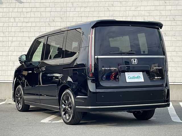 ホンダ ステップワゴン スパーダ eHEV 宮城県 2025(令7)年 0.1万km未満 クリスタルブラックパール 禁煙車/登録済み未使用車/Honda SENSING/・衝突軽減ブレーキ（ＣＭＢＳ）/・路外逸脱抑制機能/・先行車発進お知らせ機能/・アダプティブクルーズコントロール（ＡＣＣ）/・車線維持支援システム（ＬＫＡＳ）/・標識認識機能/・誤発進抑制機能 /・近距離衝突軽減ブレーキ/ブラインドスポットモニター/ハーフレザーシート/両側パワースライドドア/パドルシフト/パワーバックドア/2列目オットマン/前列USB充電ポート（タイプC）/シートヒーター/電動パーキングブレーキ/オートホールド/LEDヘッドライト/プッシュスタート/スマートキー
