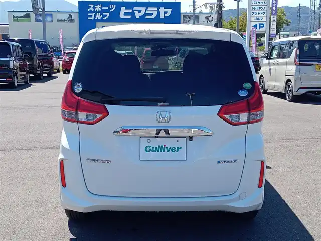 ホンダ フリード ハイブリット G ホンダセンシング 福井県 2019(令1)年 5.5万km ホワイトオーキッドパール GathersSDナビ/・Bluetooth、フルセグTV、CD、AppleCarPlay、バックカメラ/クルーズコントロール/レーンキープアシスト/横滑り防止装置/LEDオートライト/両側電動スライドドア/衝突被害軽減/ハーフレザーシート/純正フロアマット/純正アルミホイール/ビルトインETC/ウォークスルー/三列シート/スマートキー