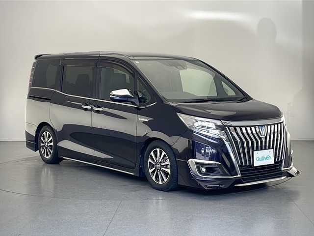 トヨタ エスクァイア ハイブリッド Gi 長野県 2018(平30)年 5.3万km スパークリングブラックパールクリスタルシャイン ALPINE9インチナビ&フルセグTV&CD&DVD&BT/ALPINE10.1インチフリップダウンモニター/クルーズコントロール/レーンディパーチャーアラート/車線逸脱警報/衝突軽減ブレーキ/先行車発進告知/BRITZ車高調/純正サスペンション積込/合皮シート/前席シートヒーター/ステアリングスイッチ/ウォークスルー/2列目サンシェード/バックカメラ/ビルトインETC/LEDヘッドライト/オートライト/オートマチックハイビーム/フロントフォグランプ/電動格納ミラー/ウィンカーミラー/純正15インチAW装着/純正フロアマット/純正ドアバイザー/プッシュスタート/スマートキー