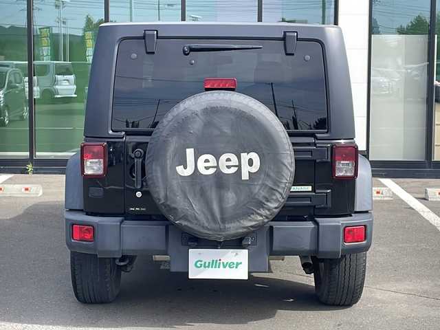 クライスラー・ジープ ジープ ラングラー アンリミテッド スポーツ 道東・釧路十勝 2018(平30)年 10.5万km 黒 ・4WD/・社外SDナビ/(FM/AM.CD/DVD.BT.フルセグ)/・バックカメラ/・クルーズコントロール/・ダウンヒルアシスト/・ETC/・背面タイヤ/・革巻きステアリング/・ステアリングスイッチ/・ABS/・横滑り防止/・純正AW付冬タイヤ　あり/・ヘッドライトレベライザー