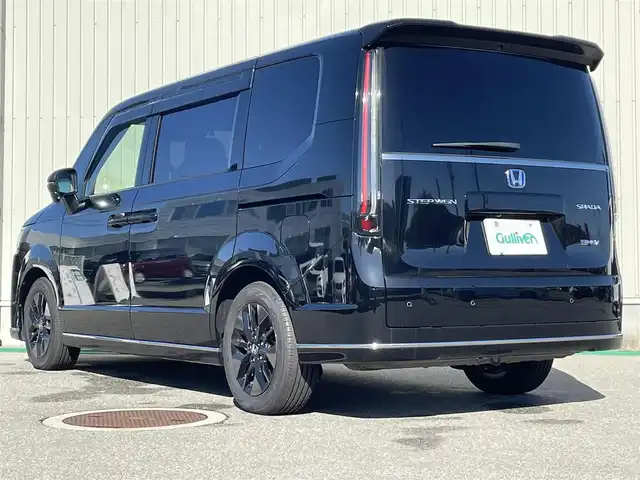 ホンダ ステップワゴン 富山県 2023(令5)年 7.8万km クリスタルブラックパール アラウンドビューモニター/メーカーナビ/フルセグＴＶ/Bluetooth/ＤＶＤ再生/ビルトインＥＴＣ/両側パワースライドドア/ハーフレザーシート/運転席助手席シートヒーター/LEDオートライト/ＬＥＤフォグライト/レーダークルーズコントロール/レーンキープアシスト/パワーバックドア