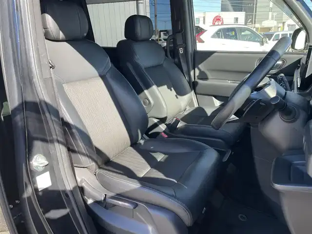 ホンダ ステップワゴン 富山県 2023(令5)年 7.8万km クリスタルブラックパール アラウンドビューモニター/メーカーナビ/フルセグＴＶ/Bluetooth/ＤＶＤ再生/ビルトインＥＴＣ/両側パワースライドドア/ハーフレザーシート/運転席助手席シートヒーター/LEDオートライト/ＬＥＤフォグライト/レーダークルーズコントロール/レーンキープアシスト/パワーバックドア