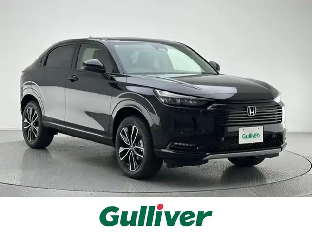 ホンダ ヴェゼル ハイブリッド e:HEV Z 兵庫県 2025(令7)年 0.1千km クリスタルブラックパール 純正メモリナビ(Bluetooth/フルセグ/USB/applecarplay/androidauto)/バックカメラ/追従型クルーズコントロール/シートヒーター(D+N席)/ステアリングヒーター/パワーバックドア/電子パーキングブレーキ/ブレーキホールド/ブラインドスポットモニター/ビルトインETC2.0/前後コーナーセンサー/置くだけ充電/純正18インチアルミホイール/オートライト/オートマチックハイビーム/LEDヘッドライト/LEDフォグライト