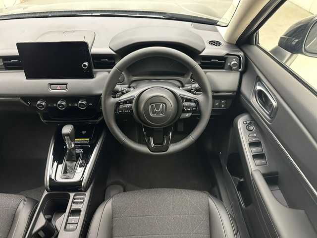 ホンダ ヴェゼル ハイブリッド e:HEV Z 兵庫県 2025(令7)年 0.1千km クリスタルブラックパール 純正メモリナビ(Bluetooth/フルセグ/USB/applecarplay/androidauto)/バックカメラ/追従型クルーズコントロール/シートヒーター(D+N席)/ステアリングヒーター/パワーバックドア/電子パーキングブレーキ/ブレーキホールド/ブラインドスポットモニター/ビルトインETC2.0/前後コーナーセンサー/置くだけ充電/純正18インチアルミホイール/オートライト/オートマチックハイビーム/LEDヘッドライト/LEDフォグライト