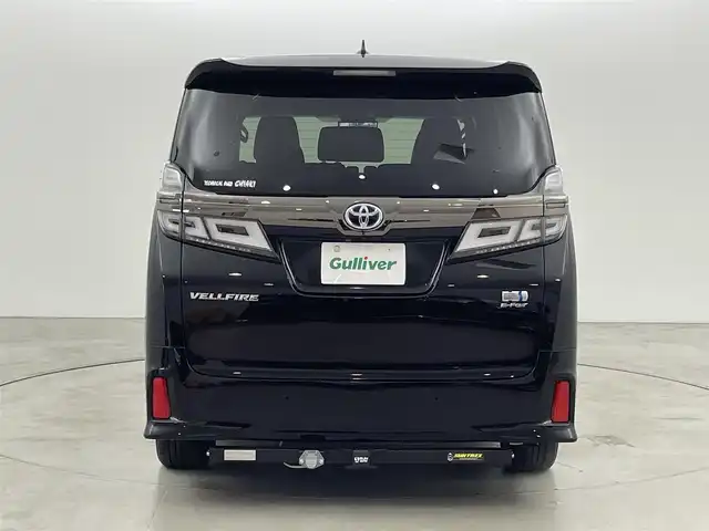 トヨタ ヴェルファイア ハイブリット ゴールデンアイズⅢ 福岡県 2022(令4)年 1.4万km ブラック 後席モニター　/純正９型ＤＡ／フルセグTV　/バックカメラ　/デジタルルームミラー　/ＥＴＣ　/トヨタセーフティセンス　/レーダークルーズコントロール　/コーナーセンサー　/衝突軽減ブレーキ　/レーンキープ　/アクセル踏み間違い防止　/ＢＳＭ　/オートマチックハイビーム　/両側電動スライドドア　/パワーバックドア　/ヒッチメンバー　/純正１７インチアルミホイール　/３眼LEDヘッドライト