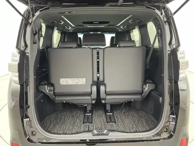 トヨタ ヴェルファイア ハイブリット ゴールデンアイズⅢ 福岡県 2022(令4)年 1.4万km ブラック 後席モニター　/純正９型ＤＡ／フルセグTV　/バックカメラ　/デジタルルームミラー　/ＥＴＣ　/トヨタセーフティセンス　/レーダークルーズコントロール　/コーナーセンサー　/衝突軽減ブレーキ　/レーンキープ　/アクセル踏み間違い防止　/ＢＳＭ　/オートマチックハイビーム　/両側電動スライドドア　/パワーバックドア　/ヒッチメンバー　/純正１７インチアルミホイール　/３眼LEDヘッドライト