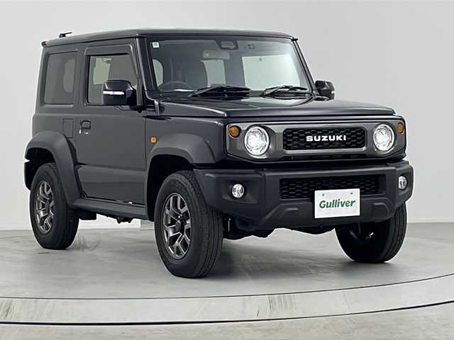 スズキ ジムニー シエラ JC 熊本県 2024(令6)年 0.6万km ブルーイッシュブラックパール3 禁煙車/衝突被害軽減ブレーキ/車線逸脱警報/純正ディスプレイオーディオ（PVH-9300DVSZS）/AM/FM/USB/Bluetooth/バックカメラ/クルーズコントロール/シートヒーター/コーナーセンサー後方/レザー調シートカバー/ダウンヒルアシスト/LEDヘッドライト/ヘッドライトウォッシャー/ドアバイザー/スマートキー/プッシュスタート/ABS/横滑り防止装置