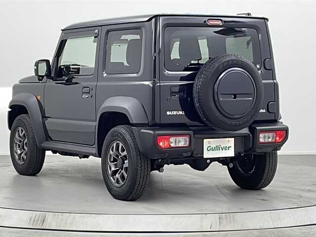 スズキ ジムニー シエラ JC 熊本県 2024(令6)年 0.6万km ブルーイッシュブラックパール3 禁煙車/衝突被害軽減ブレーキ/車線逸脱警報/純正ディスプレイオーディオ（PVH-9300DVSZS）/AM/FM/USB/Bluetooth/バックカメラ/クルーズコントロール/シートヒーター/コーナーセンサー後方/レザー調シートカバー/ダウンヒルアシスト/LEDヘッドライト/ヘッドライトウォッシャー/ドアバイザー/スマートキー/プッシュスタート/ABS/横滑り防止装置