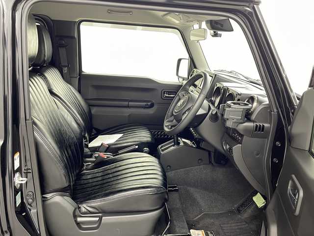 スズキ ジムニー シエラ JC 熊本県 2024(令6)年 0.6万km ブルーイッシュブラックパール3 禁煙車/衝突被害軽減ブレーキ/車線逸脱警報/純正ディスプレイオーディオ（PVH-9300DVSZS）/AM/FM/USB/Bluetooth/バックカメラ/クルーズコントロール/シートヒーター/コーナーセンサー後方/レザー調シートカバー/ダウンヒルアシスト/LEDヘッドライト/ヘッドライトウォッシャー/ドアバイザー/スマートキー/プッシュスタート/ABS/横滑り防止装置