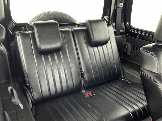 スズキ ジムニー シエラ JC 熊本県 2024(令6)年 0.6万km ブルーイッシュブラックパール3 禁煙車/衝突被害軽減ブレーキ/車線逸脱警報/純正ディスプレイオーディオ（PVH-9300DVSZS）/AM/FM/USB/Bluetooth/バックカメラ/クルーズコントロール/シートヒーター/コーナーセンサー後方/レザー調シートカバー/ダウンヒルアシスト/LEDヘッドライト/ヘッドライトウォッシャー/ドアバイザー/スマートキー/プッシュスタート/ABS/横滑り防止装置