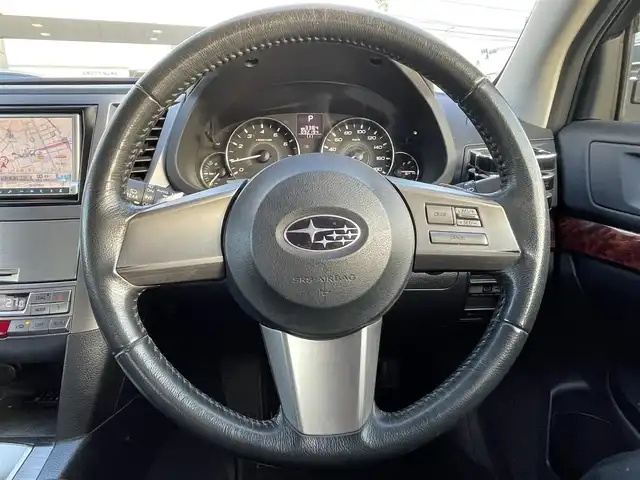 スバル レガシィ ツーリングワゴン 2．5i Lパッケージ 広島県 2011(平23)年 9.3万km サテンホワイトパール ４WD/メモリナビ/（フルセグTV/Bluetooth/SD/CD/DVD/USB）/クルーズコントロール（追従無し）/ドライブレコーダー（前方のみ）/HIDヘッドライト/フォグランプ/オートライト/純正17インチアルミホイール/本革巻きステアリング