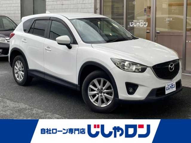 マツダ ＣＸ－５ 20S 愛知県 2012(平24)年 7.6万km クリスタルホワイトパールマイカ (株)IDOMが運営する【じしゃロン豊川店】の自社ローン専用車両になります。こちらは現金またはオートローンご利用時の価格です。自社ローンご希望の方は別途その旨お申付け下さい/ 社外オーディオ/ バックカメラ/ ETC/ 革巻ステアリング/ ドアバイザー