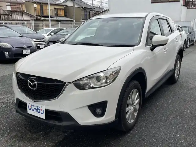 マツダ ＣＸ－５ 20S 愛知県 2012(平24)年 7.6万km クリスタルホワイトパールマイカ (株)IDOMが運営する【じしゃロン豊川店】の自社ローン専用車両になります。こちらは現金またはオートローンご利用時の価格です。自社ローンご希望の方は別途その旨お申付け下さい/ 社外オーディオ/ バックカメラ/ ETC/ 革巻ステアリング/ ドアバイザー