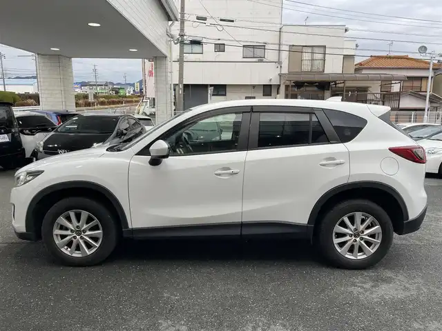 マツダ ＣＸ－５ 20S 愛知県 2012(平24)年 7.6万km クリスタルホワイトパールマイカ (株)IDOMが運営する【じしゃロン豊川店】の自社ローン専用車両になります。こちらは現金またはオートローンご利用時の価格です。自社ローンご希望の方は別途その旨お申付け下さい/ 社外オーディオ/ バックカメラ/ ETC/ 革巻ステアリング/ ドアバイザー