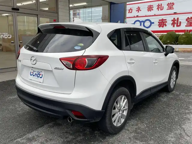 マツダ ＣＸ－５ 20S 愛知県 2012(平24)年 7.6万km クリスタルホワイトパールマイカ (株)IDOMが運営する【じしゃロン豊川店】の自社ローン専用車両になります。こちらは現金またはオートローンご利用時の価格です。自社ローンご希望の方は別途その旨お申付け下さい/ 社外オーディオ/ バックカメラ/ ETC/ 革巻ステアリング/ ドアバイザー