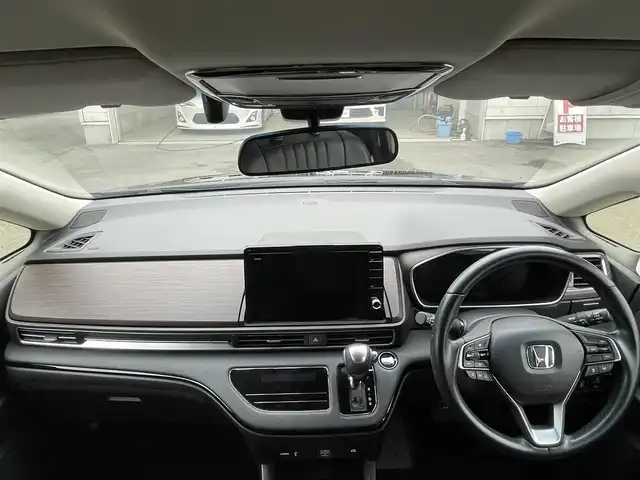 ホンダ オデッセイ ハイブリッド e:HEVアブソルート EX 群馬県 2021(令3)年 3.6万km プレミアムヴィーナスブラックP 純正１０インチナビ・Ｂｌｕｅｔｏｏｔｈ・ＨＤＭＩ・CD・DVD/純正フリップダウンモニター　/全周囲カメラ　　/レーンアシスト　/衝突軽減ブレーキ　/コーナーセンサー　/黒レザーシート　/電動リアドア　/ハンドル支援　/レザーシート/純正フロアマット