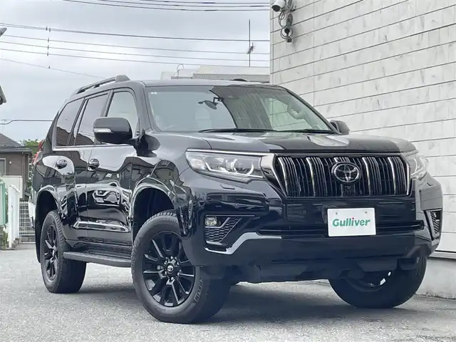 トヨタ ランドクルーザー プラド TX-L 70thアニバーサリーLTD 埼玉県 2021(令3)年 2.7万km アティチュードブラックマイカ 外部検査済み/メーカーナビゲーション/(AM/FM/CD/DVD/フルセグＴＶ/Bluetooth/ＵＳＢ)/アラウンドビュー/トヨタセーフティセンス/レーンディパーチャーアラート/レーダークルーズコントロール/ブラインドスポットモニター/オートマチックハイビーム/ヘッドライトウォッシャー/ウッドデッキコンビハンドル/ブラウンレザーシート/前席パワーシート/前席エアシート/前席シートヒーター/７０ｔｈ純正フロアマット/スマートキー/ルーフレール/4WD/ETC