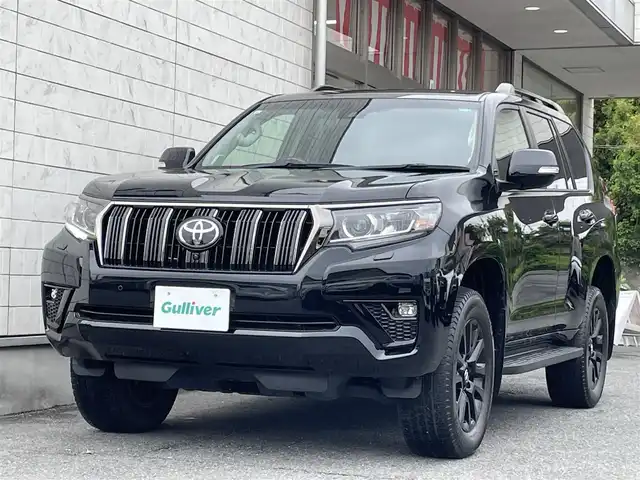 トヨタ ランドクルーザー プラド TX-L 70thアニバーサリーLTD 埼玉県 2021(令3)年 2.7万km アティチュードブラックマイカ 外部検査済み/メーカーナビゲーション/(AM/FM/CD/DVD/フルセグＴＶ/Bluetooth/ＵＳＢ)/アラウンドビュー/トヨタセーフティセンス/レーンディパーチャーアラート/レーダークルーズコントロール/ブラインドスポットモニター/オートマチックハイビーム/ヘッドライトウォッシャー/ウッドデッキコンビハンドル/ブラウンレザーシート/前席パワーシート/前席エアシート/前席シートヒーター/７０ｔｈ純正フロアマット/スマートキー/ルーフレール/4WD/ETC
