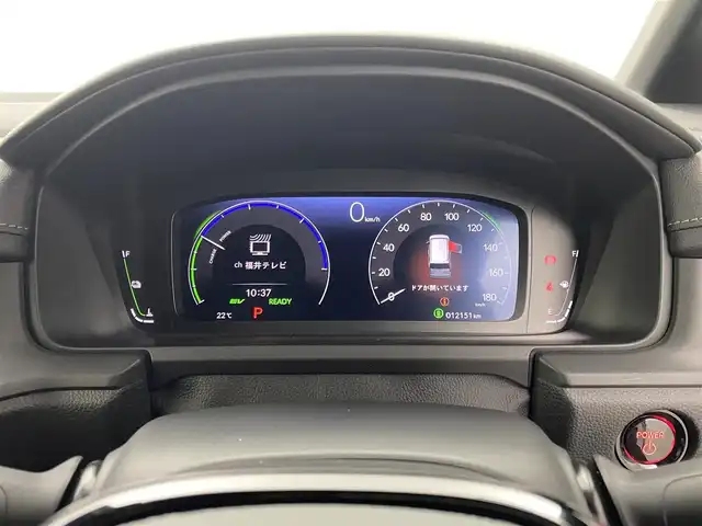 ホンダ ステップワゴン スパーダ eHEV 福井県 2024(令6)年 1.3万km プラチナホワイトパール 純正11インチナビ（LXM-247VFLi）/-フルセグTV/CD/DVD/Bluetooth/USB/AppleCarPlay/AndroidAuto/純正フロアマット/前後ドライブレコーダー/バックカメラ/ホンダセンシング/衝突軽減ブレーキ/BSM/パワーテールゲート/前後コーナーセンサー/両側パワースライドドア/レーダークルーズコントロール/レーンキープアシスト/ハーフレザーシート/前席シートヒーター/オットマン/パドルシフト/トリプルゾーンAC/16インチAW/電子ブレーキ/ブレーキホールド/オートライト/オートハイビーム/LEDヘッドライト/背面テーブル